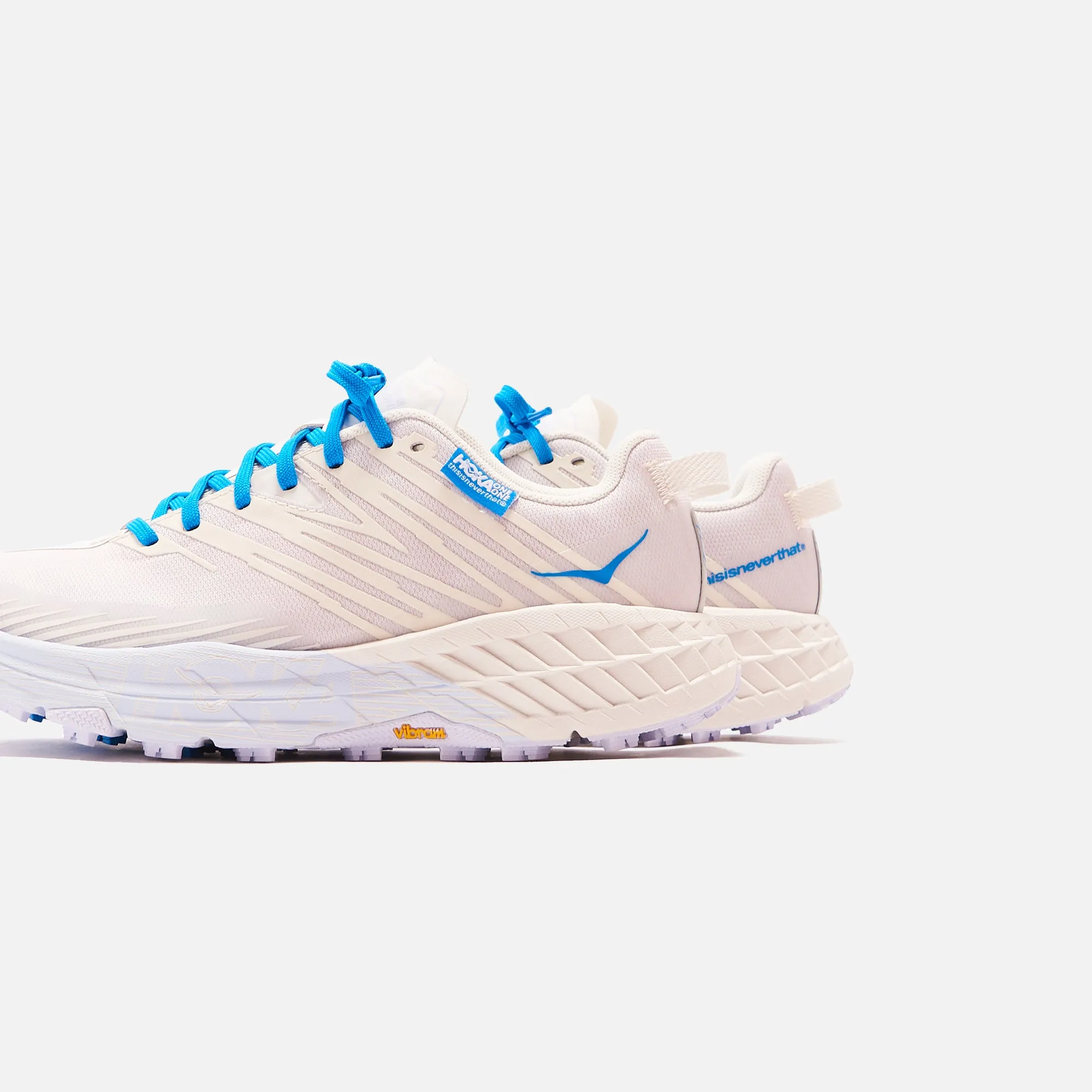 Hoka x Thisisneverthat Speedgoat 4 - Marshmallow / Cyan Blue